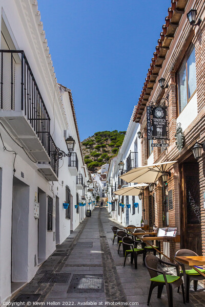 Typical street in Mijas, Andalusia, Spain Picture Board by Kevin Hellon