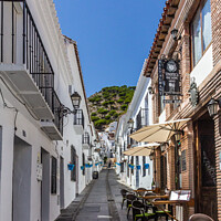 Buy canvas prints of Typical street in Mijas, Andalusia, Spain by Kevin Hellon