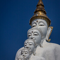 Buy canvas prints of Five white Buddha statues at Wat Pha Sorn Kaew, by Kevin Hellon