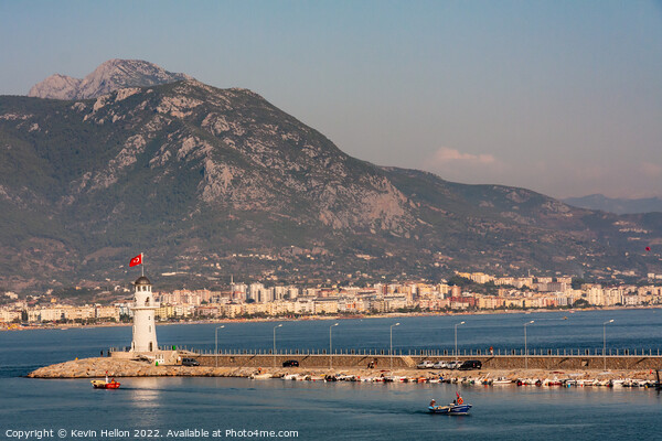 Lighthouse at entrance to Alanya Harbour Picture Board by Kevin Hellon