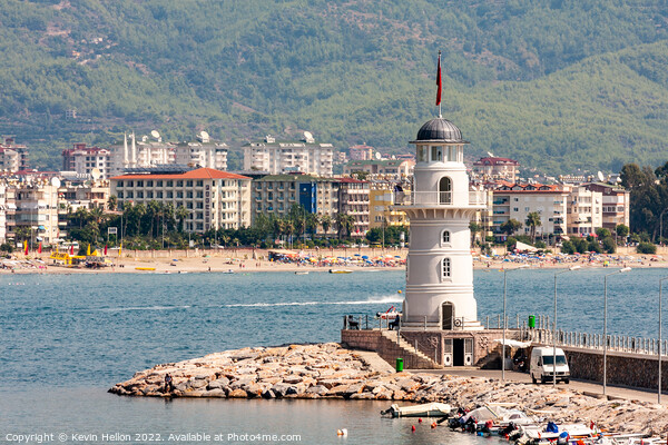 Lighthouse at entrance to Alanya Harbour, Turkey Picture Board by Kevin Hellon