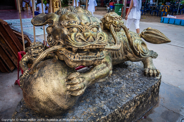 Temple lion, Bangkok, Thailand Picture Board by Kevin Hellon