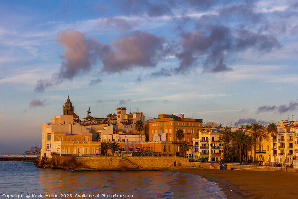 View of Sitges, Spain basking in the early morning Picture Board by Kevin Hellon