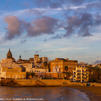 Buy canvas prints of View of Sitges, Spain basking in the early morning by Kevin Hellon