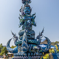 Buy canvas prints of Statue at the Blue Temple, by Kevin Hellon
