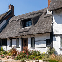 Buy canvas prints of Picturesque Thatched Cottages in Wendover by Kevin Hellon