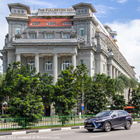 Buy canvas prints of Car driving past the Fullerton Hotel  by Kevin Hellon