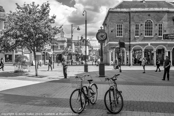 Bicycles in front of the Millenium clock, High Wycombe  Picture Board by Kevin Hellon