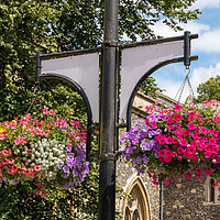 Buy canvas prints of Hanging baskets outside St Marys Church, High Wycombe by Kevin Hellon