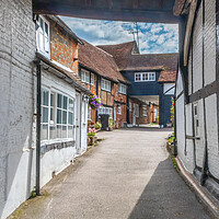 Buy canvas prints of Entrance to mews cottages in  Old Amersham by Kevin Hellon