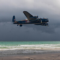 Buy canvas prints of Lancaster bomber over the sea and under a dark, cloudy sky by Kevin Hellon