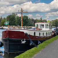 Buy canvas prints of Barge moored on the River Thames in Henley  by Kevin Hellon