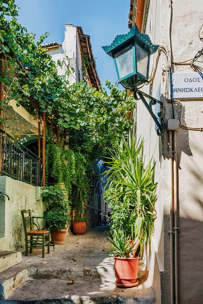 Typical street in the Plaka District Picture Board by Kevin Hellon