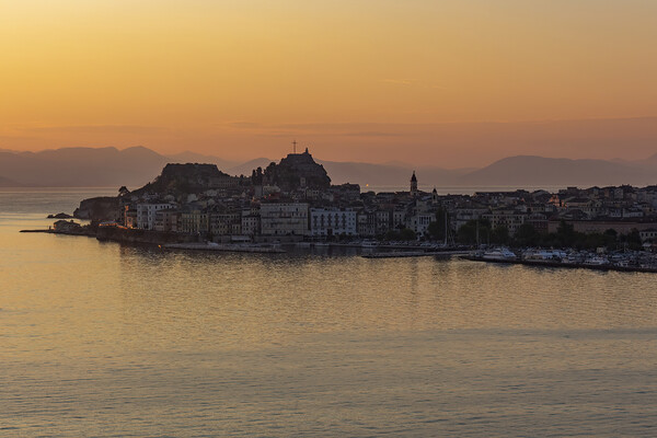 Dawn over Corfu Town, Greece Picture Board by Kevin Hellon