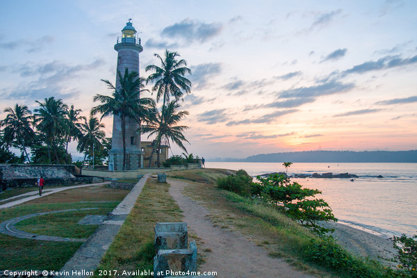 Galle fort lighthouse at sunrise Picture Board by Kevin Hellon