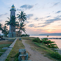 Buy canvas prints of Galle fort lighthouse at sunrise by Kevin Hellon