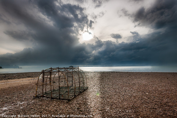 Fish trap on stony beach Picture Board by Kevin Hellon