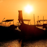 Buy canvas prints of Silhouettes of long tail fishing boats, Pak Meng,  by Kevin Hellon