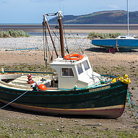 Buy canvas prints of Boats moored in Red Wharf BayAnglesey at low tide. by Kevin Hellon