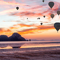 Buy canvas prints of Hot air balloons over Hua Hin beach, Trang, Thaila by Kevin Hellon