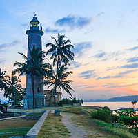 Buy canvas prints of Galle fort lighthouse at sunrise by Kevin Hellon