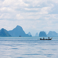 Buy canvas prints of Two men in a boat fishing by Kevin Hellon