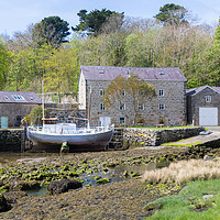 Buy canvas prints of Old mill by a creek in Anglesey, Wales, UNited Kin by Kevin Hellon