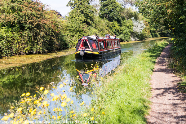 A narrowboat makes its way along the Grand Union c Picture Board by Kevin Hellon