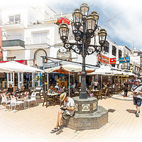 Buy canvas prints of Shoppers in a pedestrianised street. by Kevin Hellon