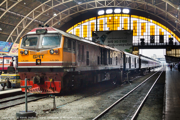 Diesel locomotive with carriages in Hua Lampong  Picture Board by Kevin Hellon