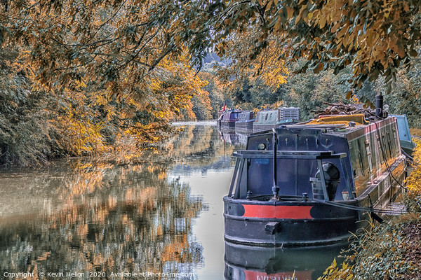Narrowboats moored on  the Grand Union canal  Picture Board by Kevin Hellon