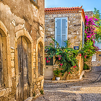Buy canvas prints of Cobbled street in Alacati by Kevin Hellon