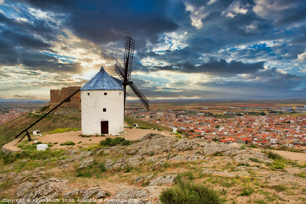 Windmill overlooking town of Consuegra, Spain Picture Board by Kevin Hellon