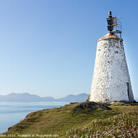 Buy canvas prints of Old lighthouse on Llanddwyn Island by Kevin Hellon