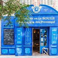 Buy canvas prints of Tourist shop in the Old Port area by Kevin Hellon