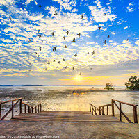 Buy canvas prints of Sunrise with sunrays and flock of birds by Kevin Hellon
