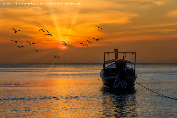 Boat facing the sunset in Pak Meng Picture Board by Kevin Hellon