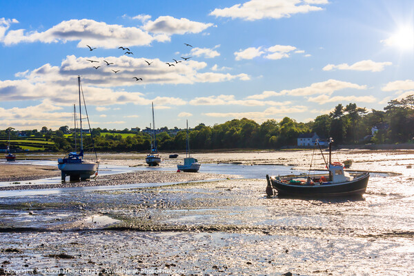 Boats at anchor in Red Wharf Bay Picture Board by Kevin Hellon