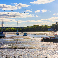 Buy canvas prints of Boats at anchor in Red Wharf Bay by Kevin Hellon