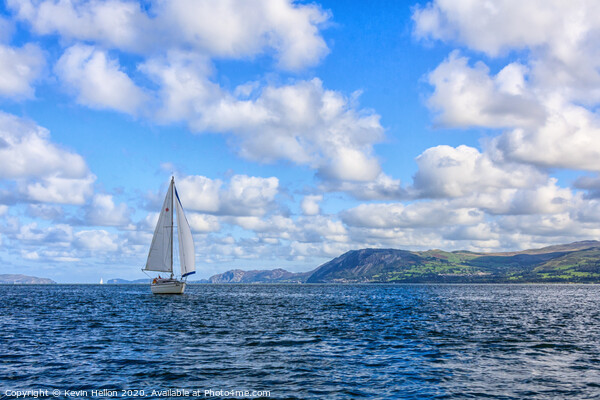 Yacht sailing in the Menai Straits Picture Board by Kevin Hellon