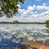 Buy canvas prints of Cloud reflections in Inya Lake, Yangon, Myanmar by Kevin Hellon