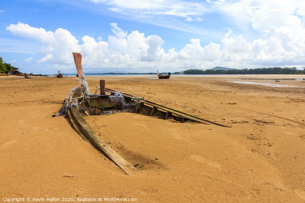 Old boat buried in the sand Picture Board by Kevin Hellon