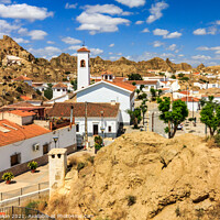 Buy canvas prints of Cave house neighbourhood in Guadix by Kevin Hellon