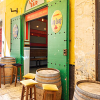 Buy canvas prints of The Loop bar, Valetta, Malta by Kevin Hellon