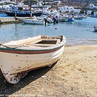 Buy canvas prints of Small boat beached on sand  by Kevin Hellon