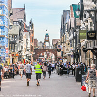 Buy canvas prints of Shoppers walking in Eastgate street by Kevin Hellon