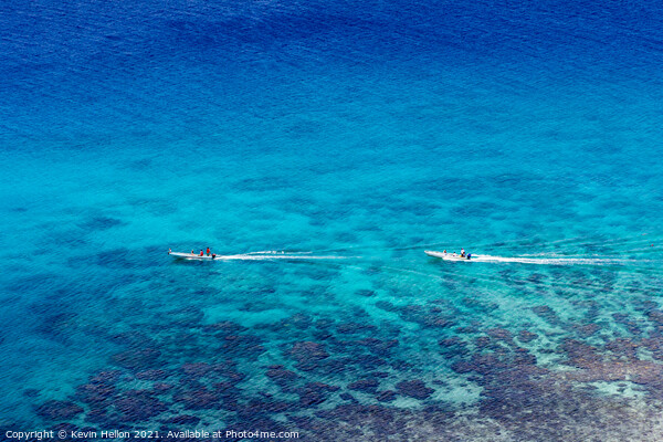 Boats off Dravuni Island Picture Board by Kevin Hellon