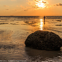 Buy canvas prints of Rock and fisherman silhouette  by Kevin Hellon