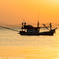 Buy canvas prints of Fishing boat at sunset by Kevin Hellon