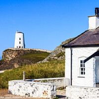 Buy canvas prints of Pilot's cottage with lighthouse in the background by Kevin Hellon